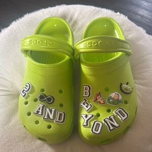 Crocs Adult Green Clogs with Toy Story Charms